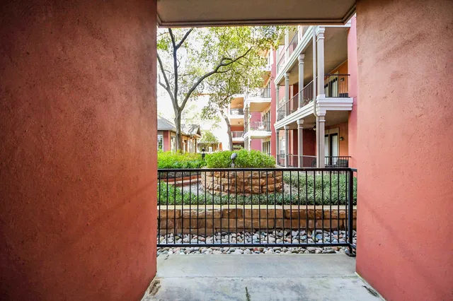 a view of a building from a balcony