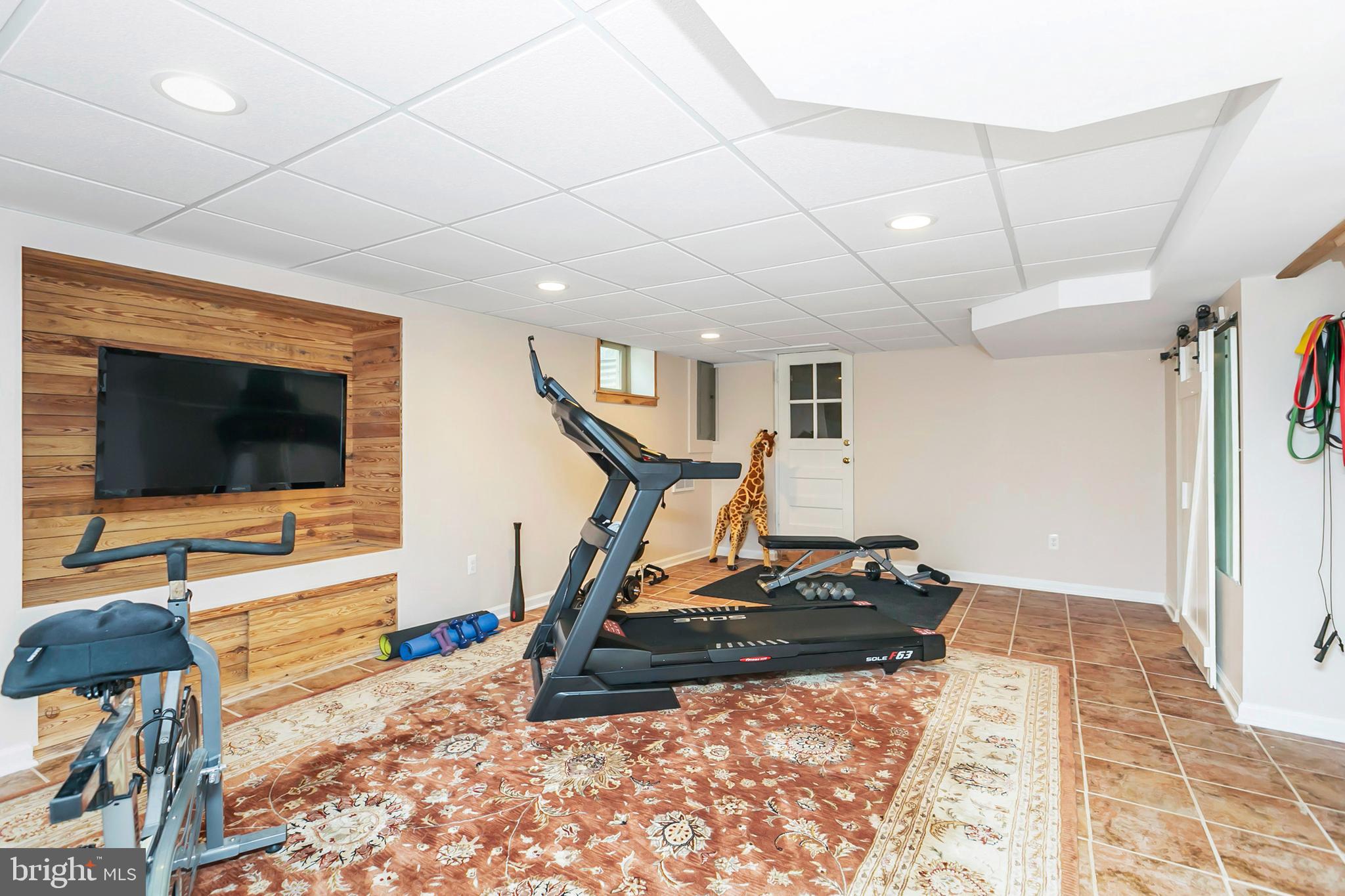 12232 Dover Road Reisterstown, MD 21136 - Photo 27 of 36 Finished basement area with tile floor