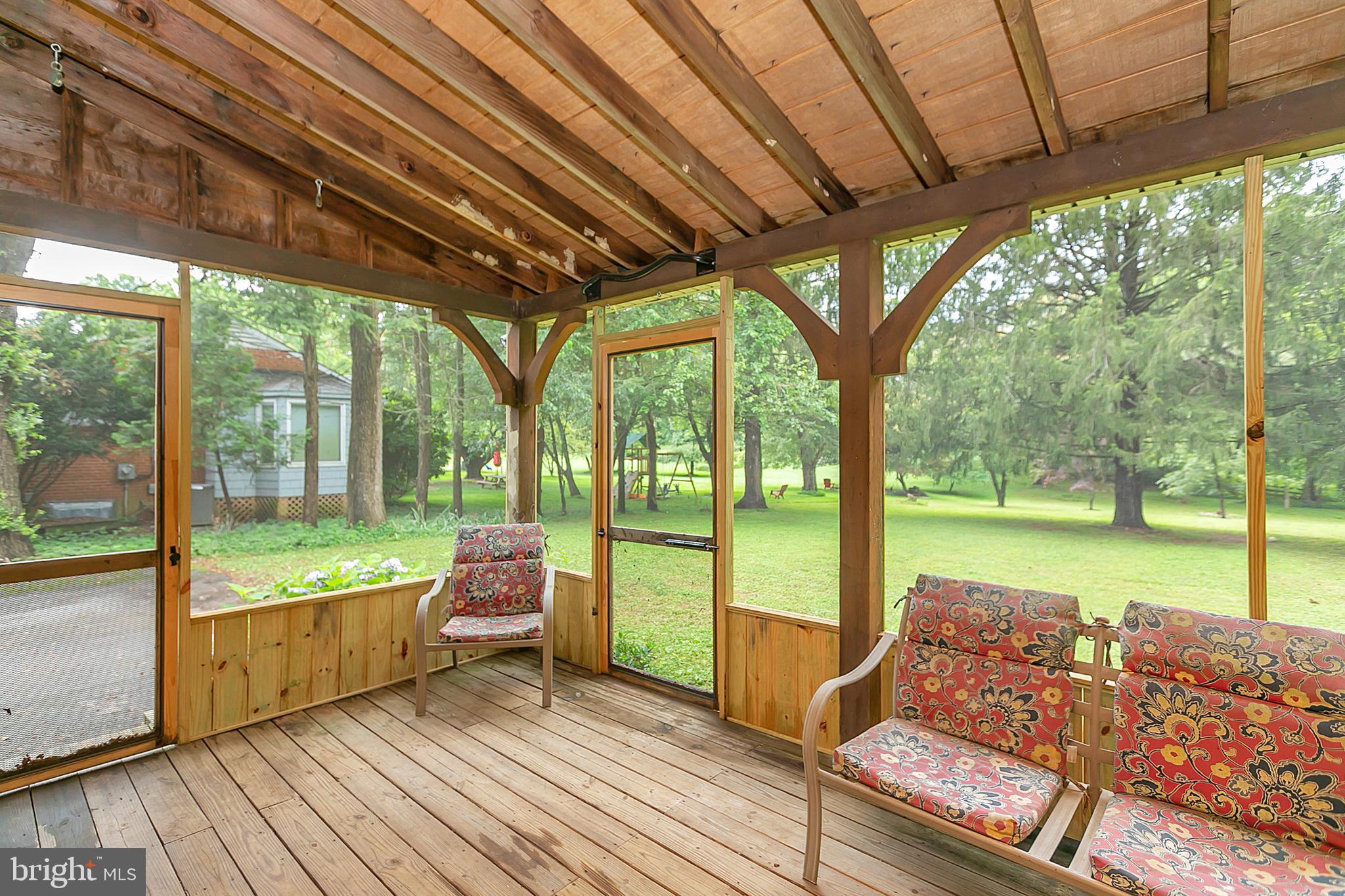 12232 Dover Road Reisterstown, MD 21136 - Photo 30 of 36 Screened in rear porch deck