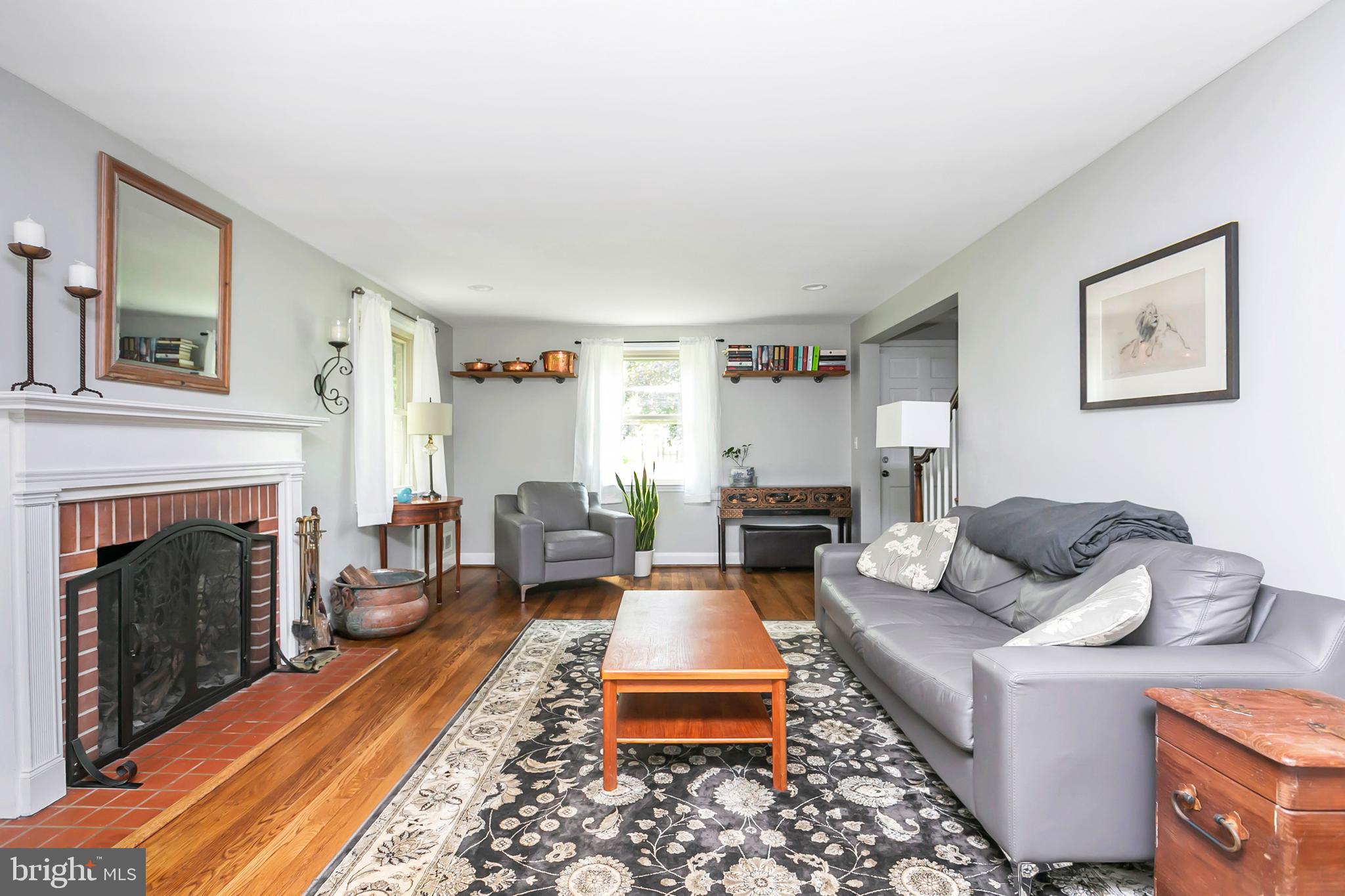12232 Dover Road Reisterstown, MD 21136 - Photo 4 of 36 The living room features a wood burning fireplace.