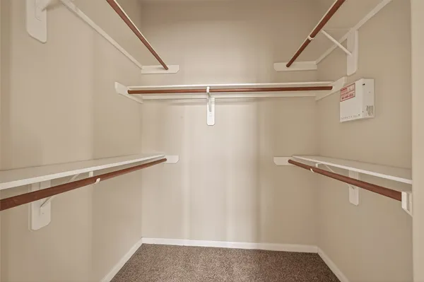 a view of small space with racks on the wall