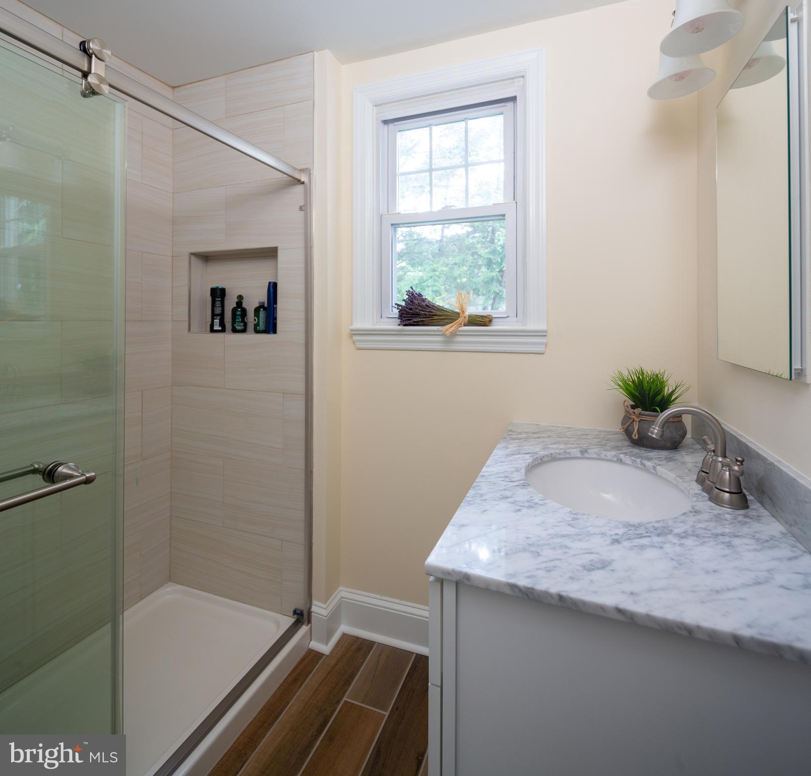 13 Wendover Road Yardley, PA 19067 - Photo 18 of 35 Totally updated main level bathroom with shower.