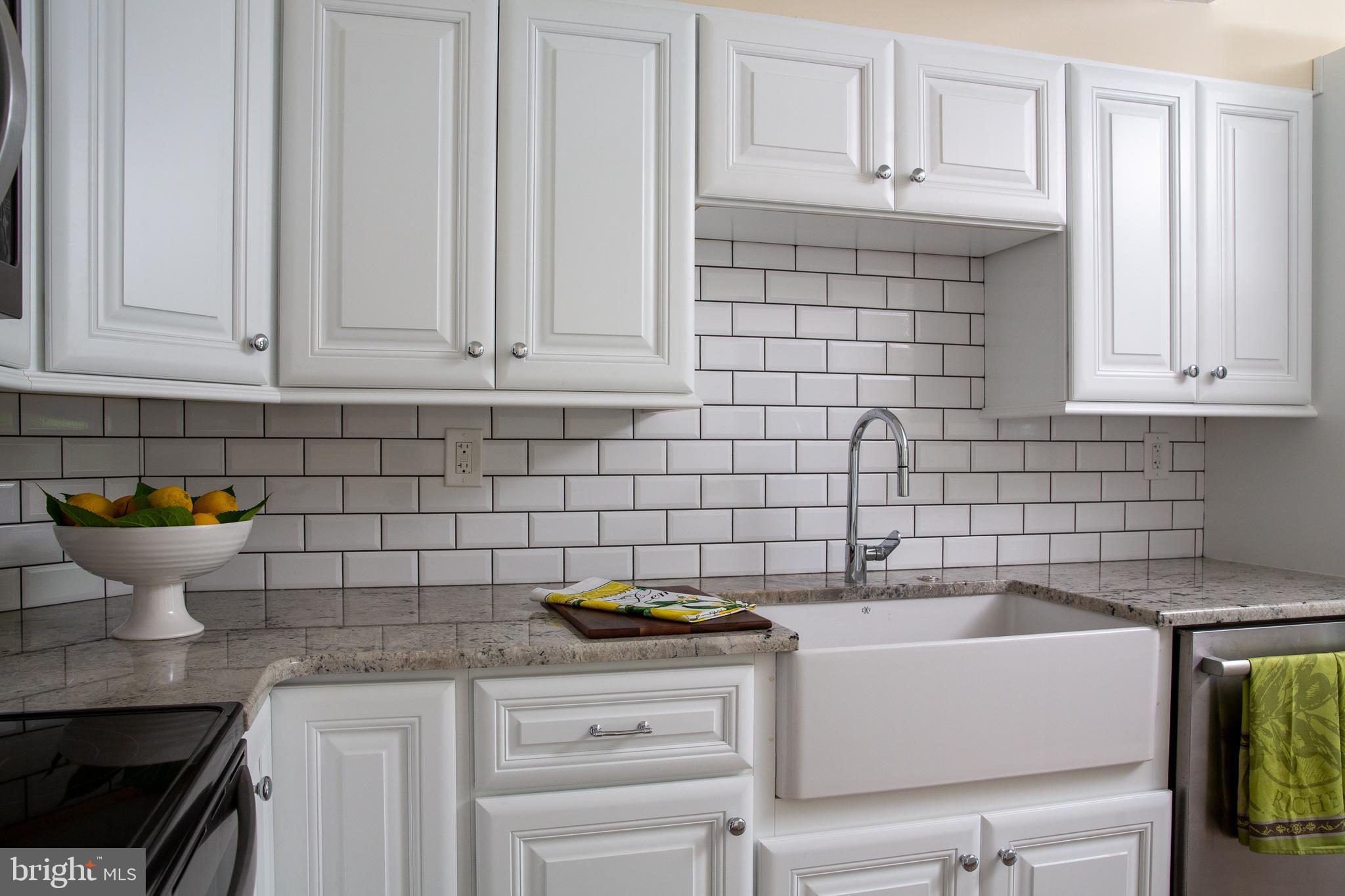13 Wendover Road Yardley, PA 19067 - Photo 9 of 35 Farm sink, subway tiles and stainless appliances