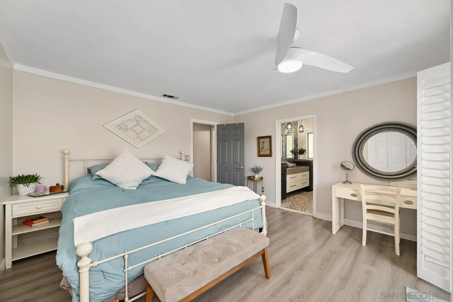 26138 Jesmond Dene Road Escondido, CA 92026 - Photo 11 of 34 a bedroom with a bed a table and chair