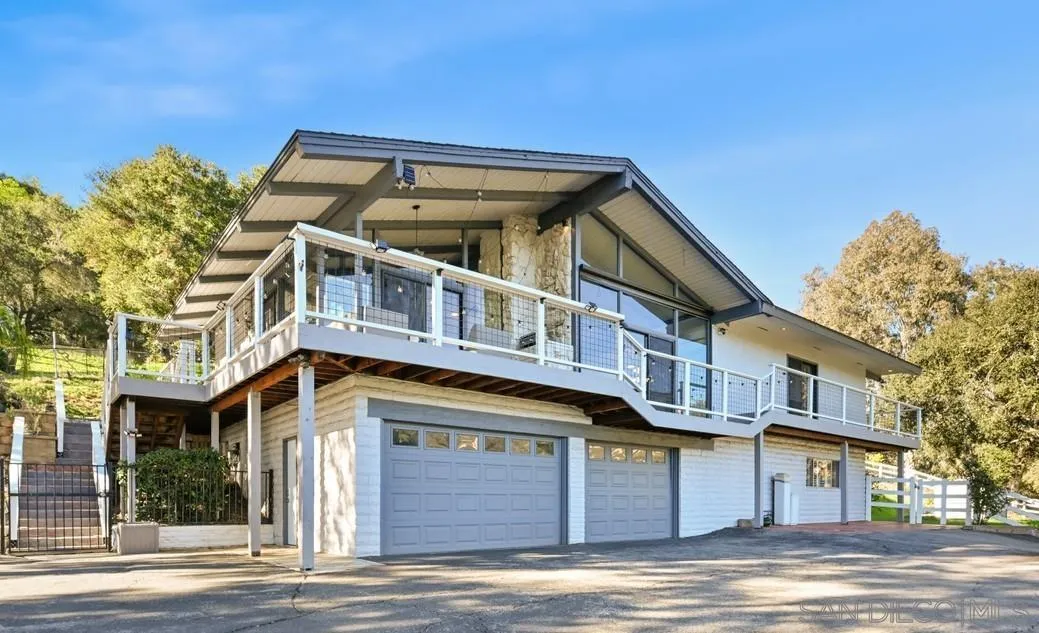 26138 Jesmond Dene Road Escondido, CA 92026 - Photo 2 of 34 a view of a building with a window