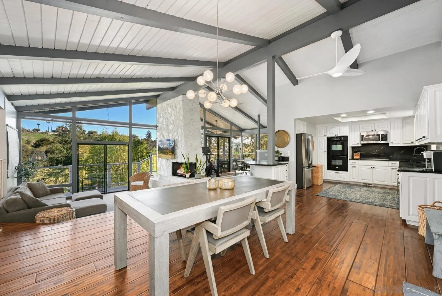 26138 Jesmond Dene Road Escondido, CA 92026 - Photo 8 of 34 a large kitchen with a table and chairs