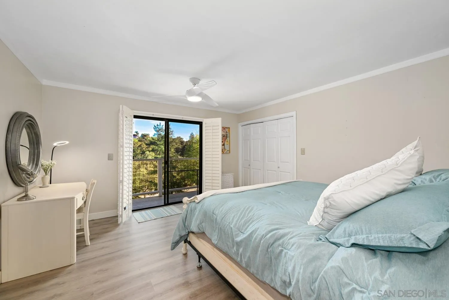 26138 Jesmond Dene Road Escondido, CA 92026 - Photo 10 of 34 a spacious bedroom with a bed and a large window