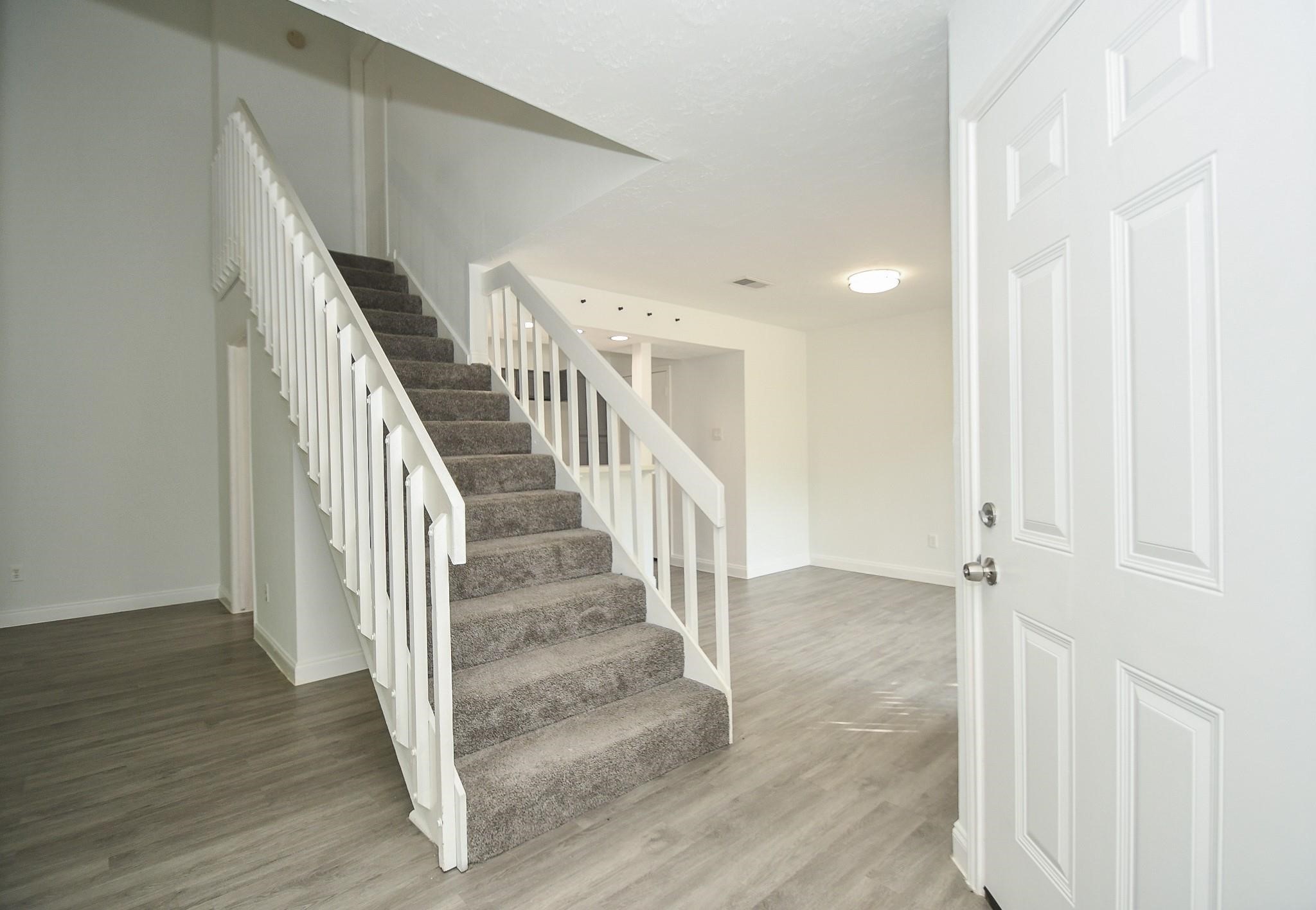 8803 Vinkins Road Houston, TX 77071 - Photo 13 of 13 a view of entryway with wooden floor