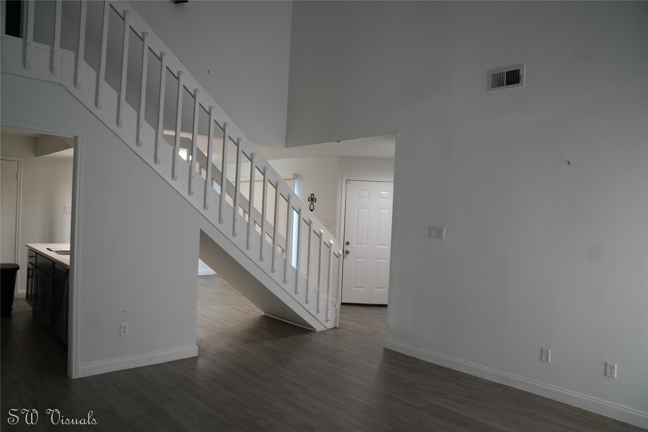 8803 Vinkins Road Houston, TX 77071 - Photo 4 of 13 a view of staircase with wooden floor