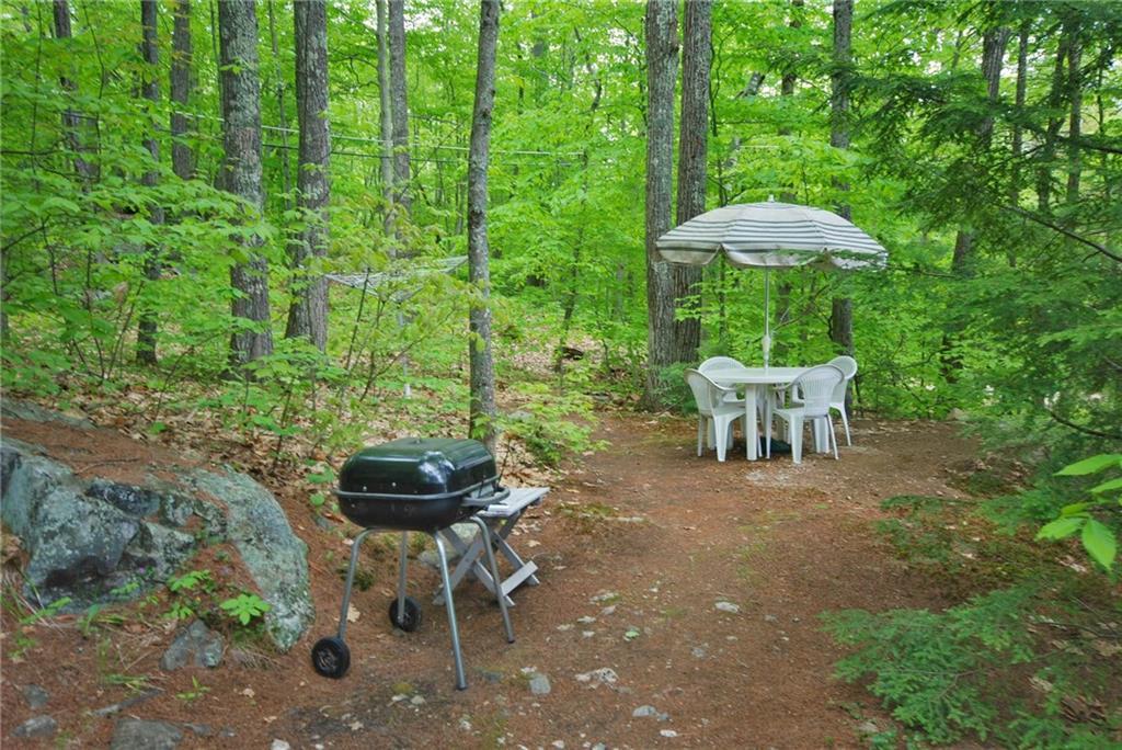 21 Coffee Pond Road Casco, ME 04015 - Photo 8 of 27 Patio area along side the house for...