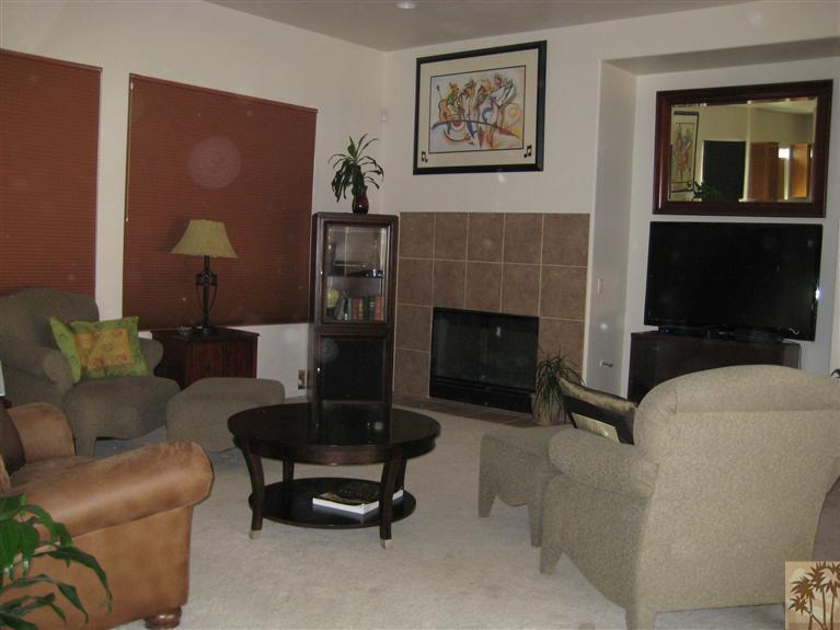 60143 Range View Drive Palm Springs, CA 92262 - Photo 4 of 11 a living room with furniture and a fireplace