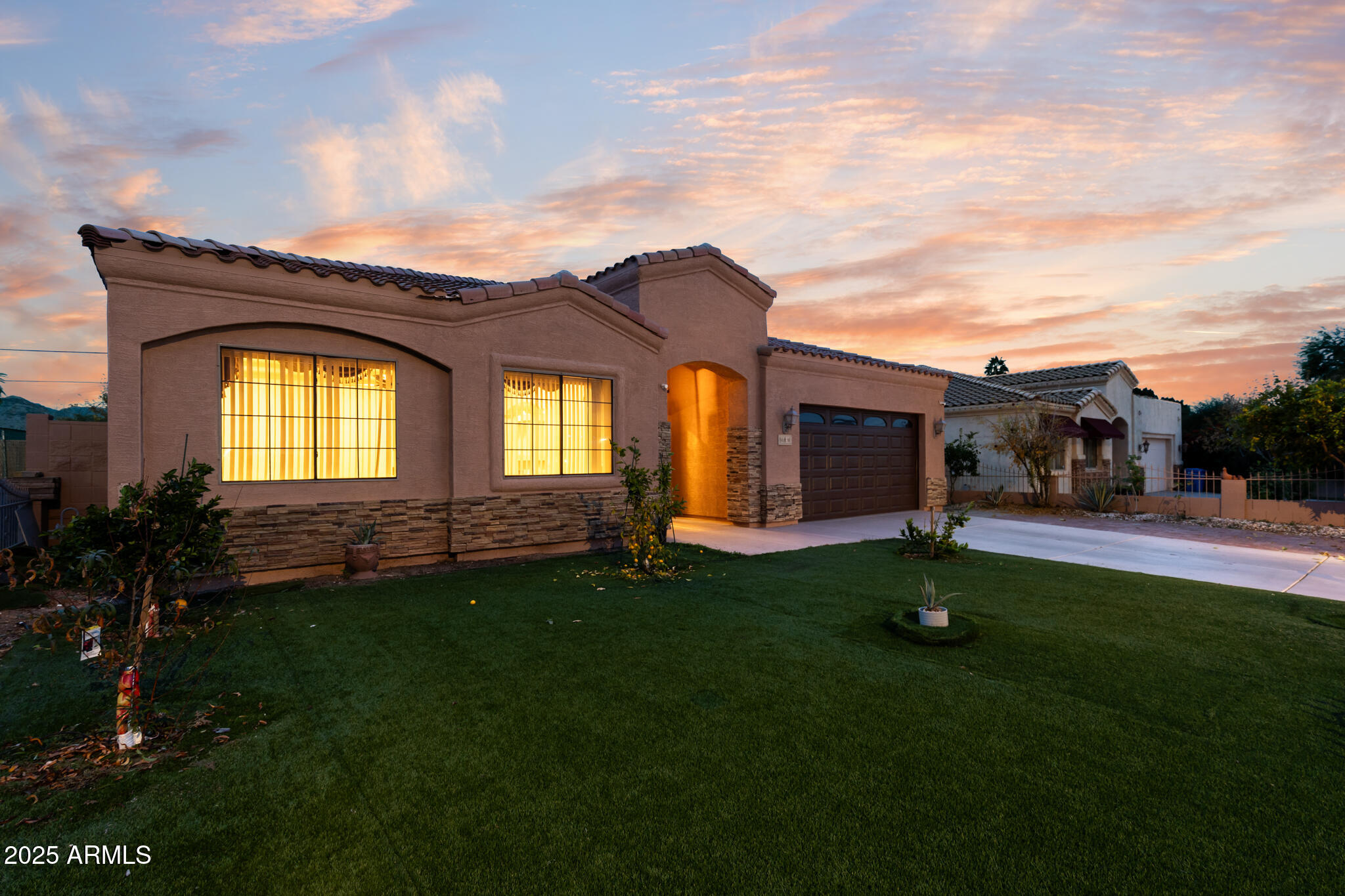 a house view with a garden space