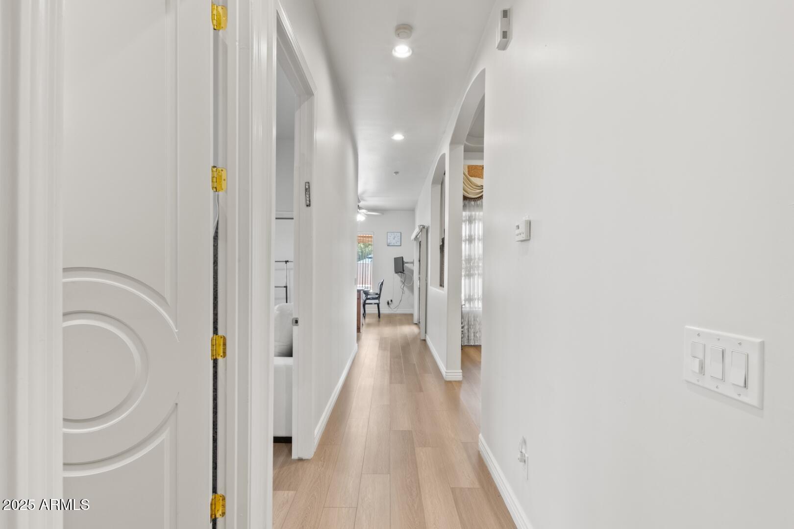 6829 North 14th Street Phoenix, AZ 85014 - Photo 26 of 53 a view of a hallway with a washer and dryer