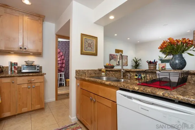 a bedroom with furniture and a book shelf