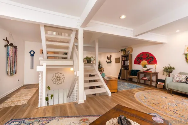 a bathroom with a toilet sink and shower