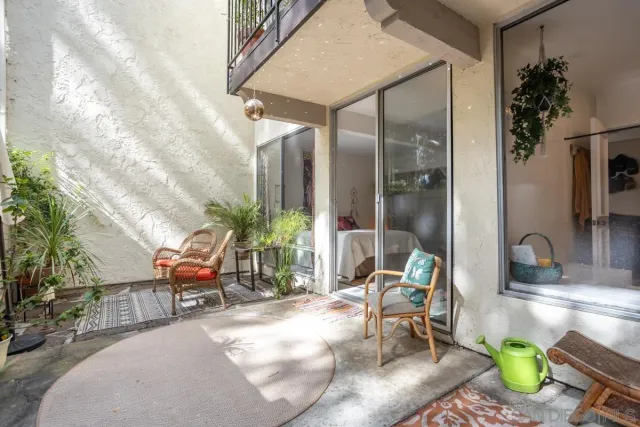 an aerial view of a house with a swimming pool and garden view