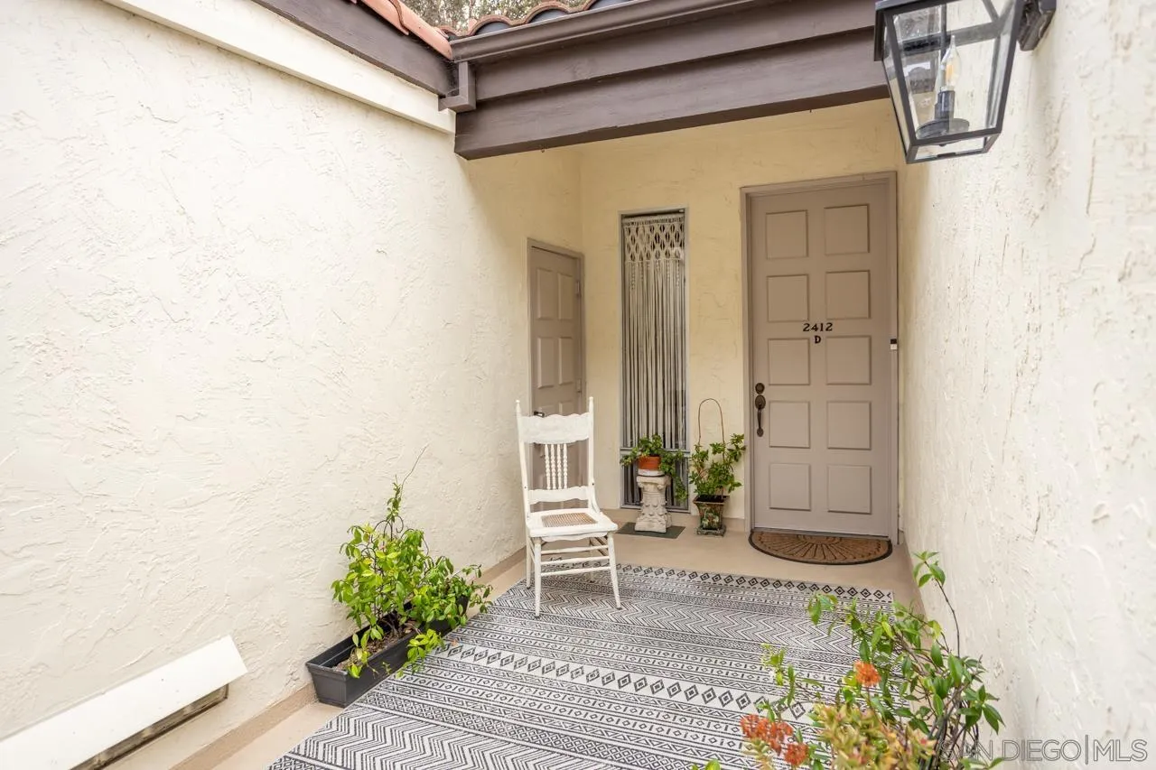 2412 Altisma Way, Unit D Carlsbad, CA 92009 - Photo 40 of 46 a view of a entryway door of the house