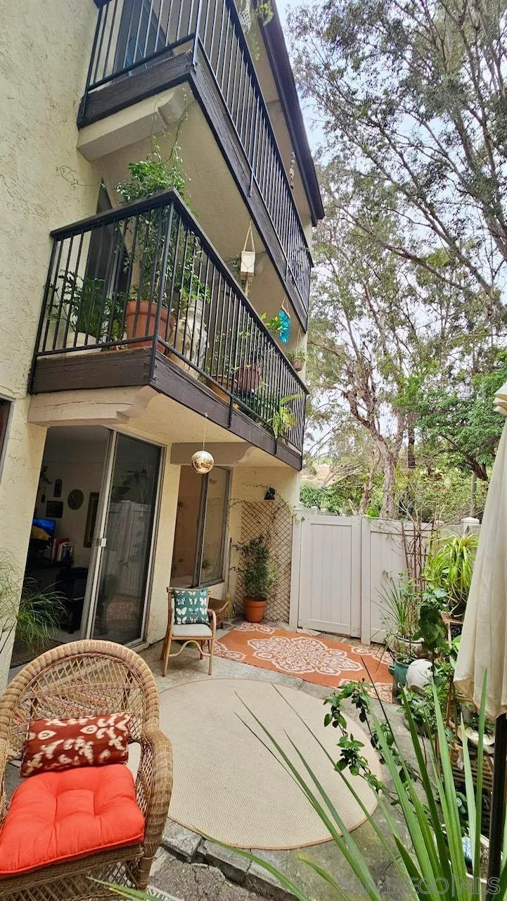 2412 Altisma Way, Unit D Carlsbad, CA 92009 - Photo 42 of 46 a view of a building with a door