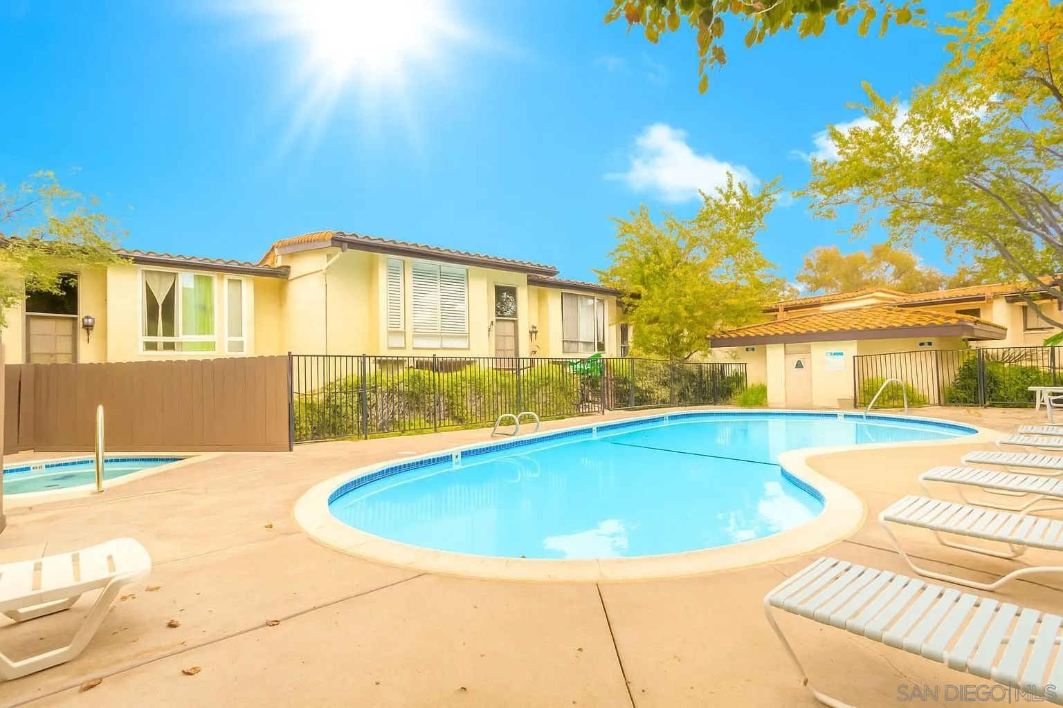 2412 Altisma Way, Unit D Carlsbad, CA 92009 - Photo 43 of 46 a view of a house with swimming pool