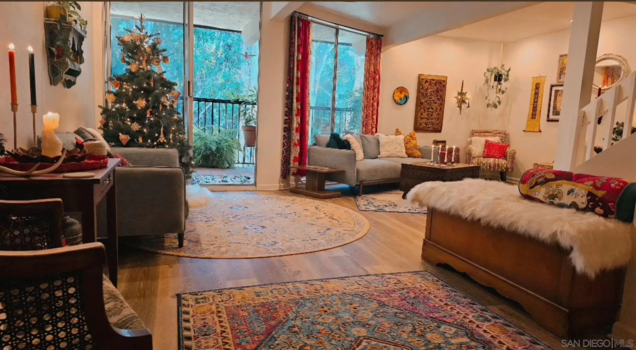 2412 Altisma Way, Unit D Carlsbad, CA 92009 - Photo 7 of 46 a living room with furniture and a large window