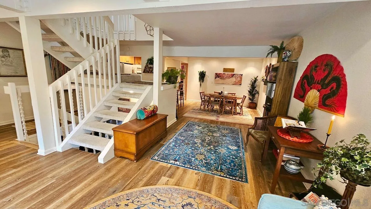 2412 Altisma Way, Unit D Carlsbad, CA 92009 - Photo 10 of 46 a view of an entryway with wooden floor