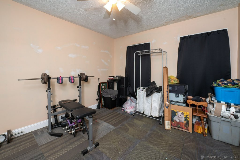 21 Poplar Street Waterbury, CT 06708 - Photo 11 of 31 a view of a room with gym equipment