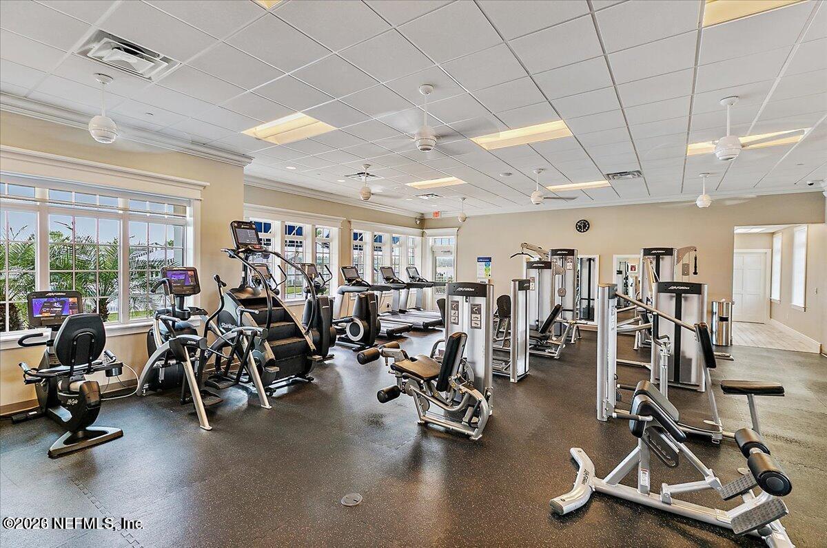 197 Charlie Way St. Augustine, FL 32095 - Photo 35 of 37 a view of a room with gym equipment