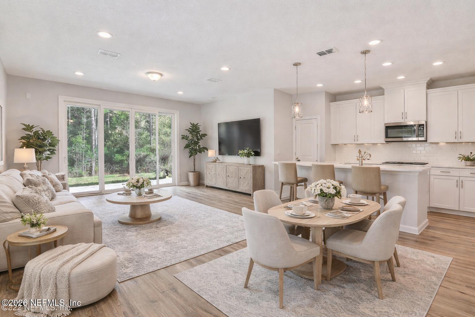 197 Charlie Way St. Augustine, FL 32095 - Photo 4 of 25 staged living, kitchen dinning