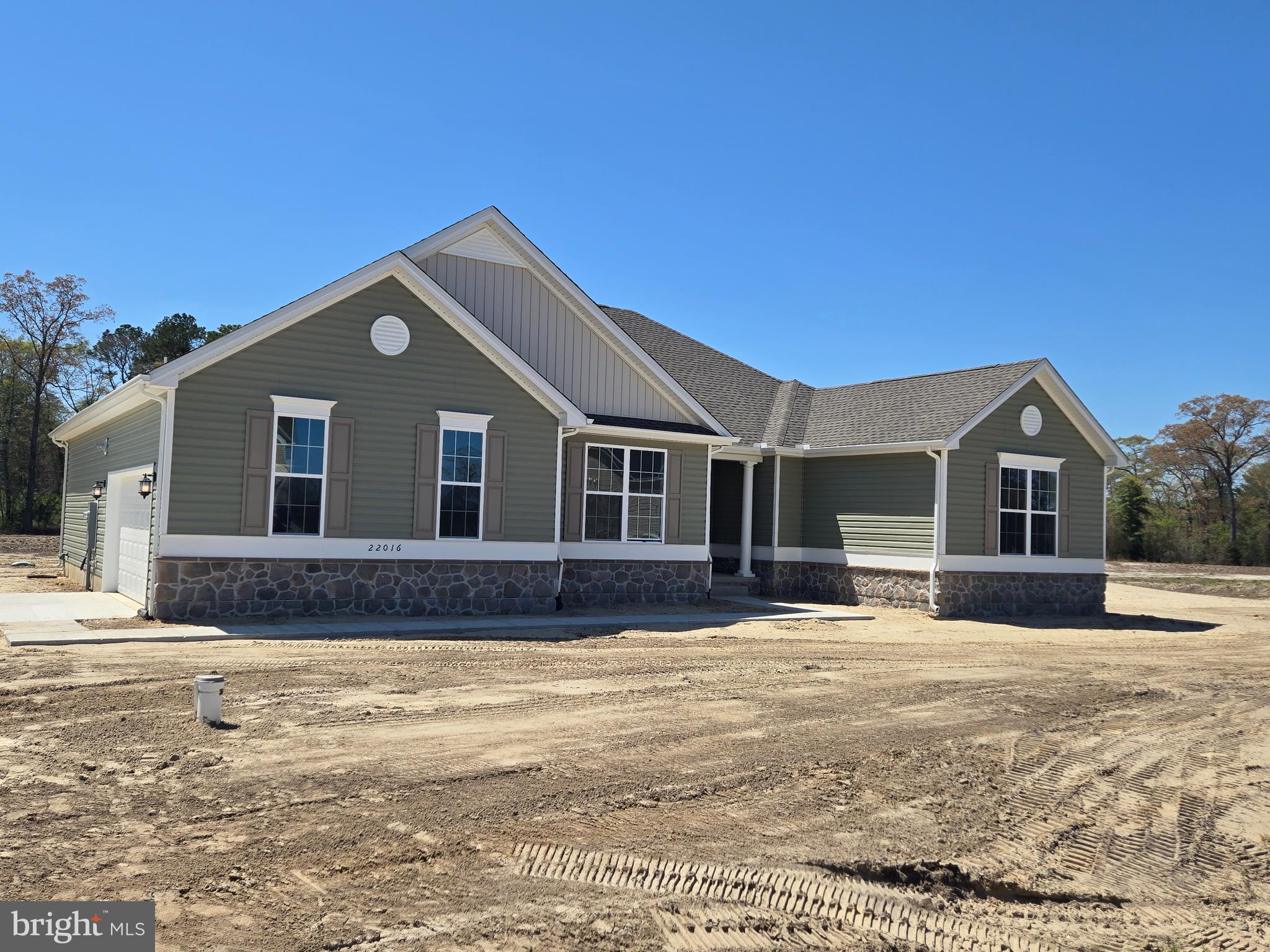 1 William Street Georgetown, DE 19947 - Photo 3 of 34 a front view of a house with a yard