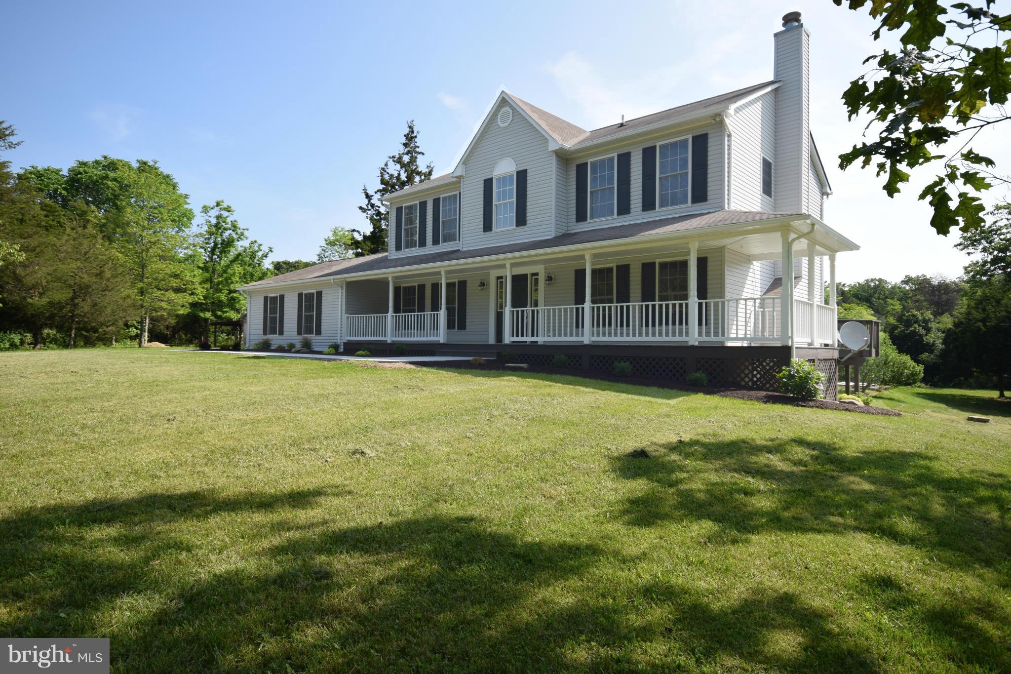 150 High Bluff Road Middletown, VA 22645 - Photo 2 of 30 a view of a house with yard and sitting area