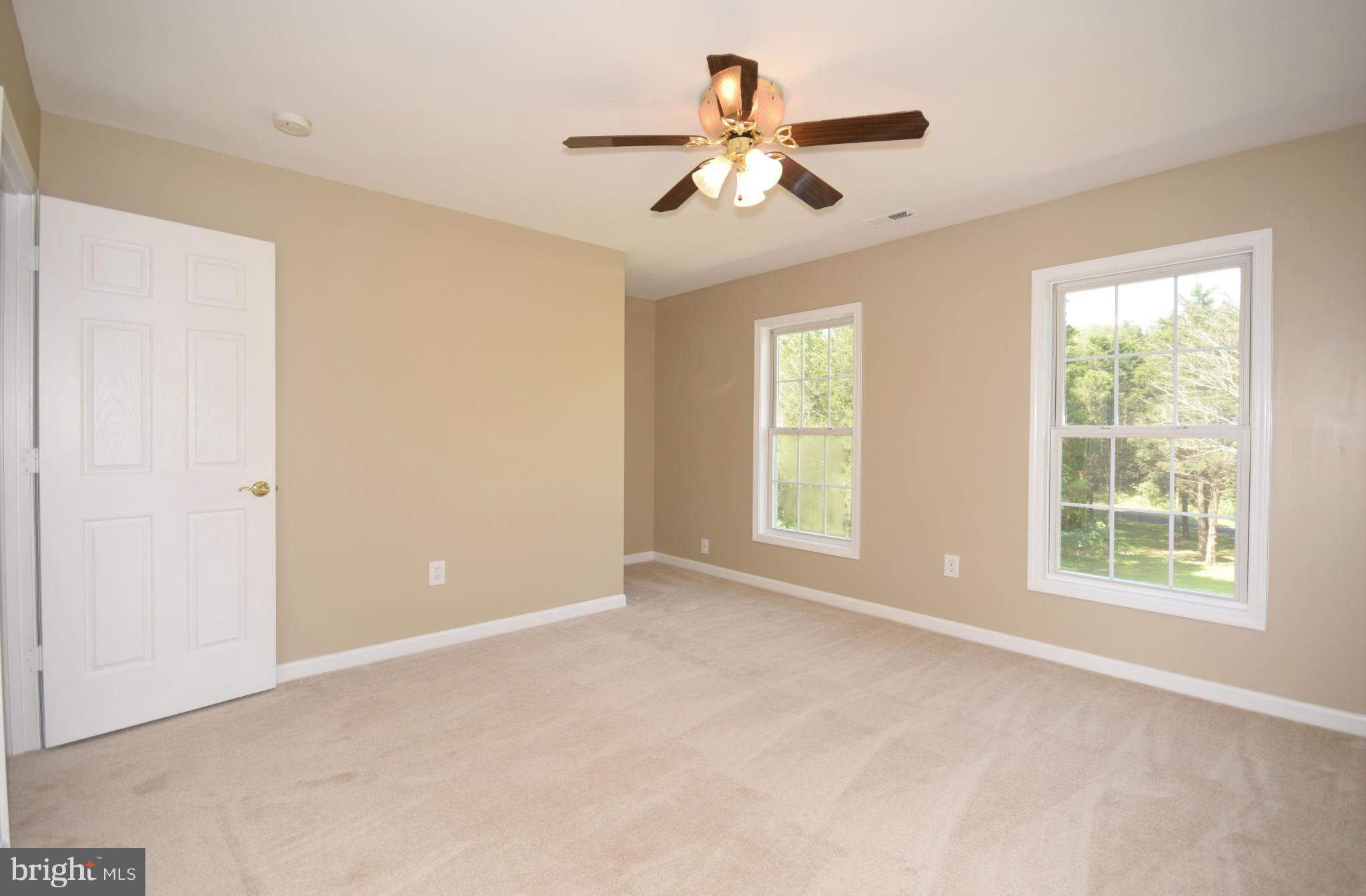 150 High Bluff Road Middletown, VA 22645 - Photo 18 of 30 a view of an empty room with a window