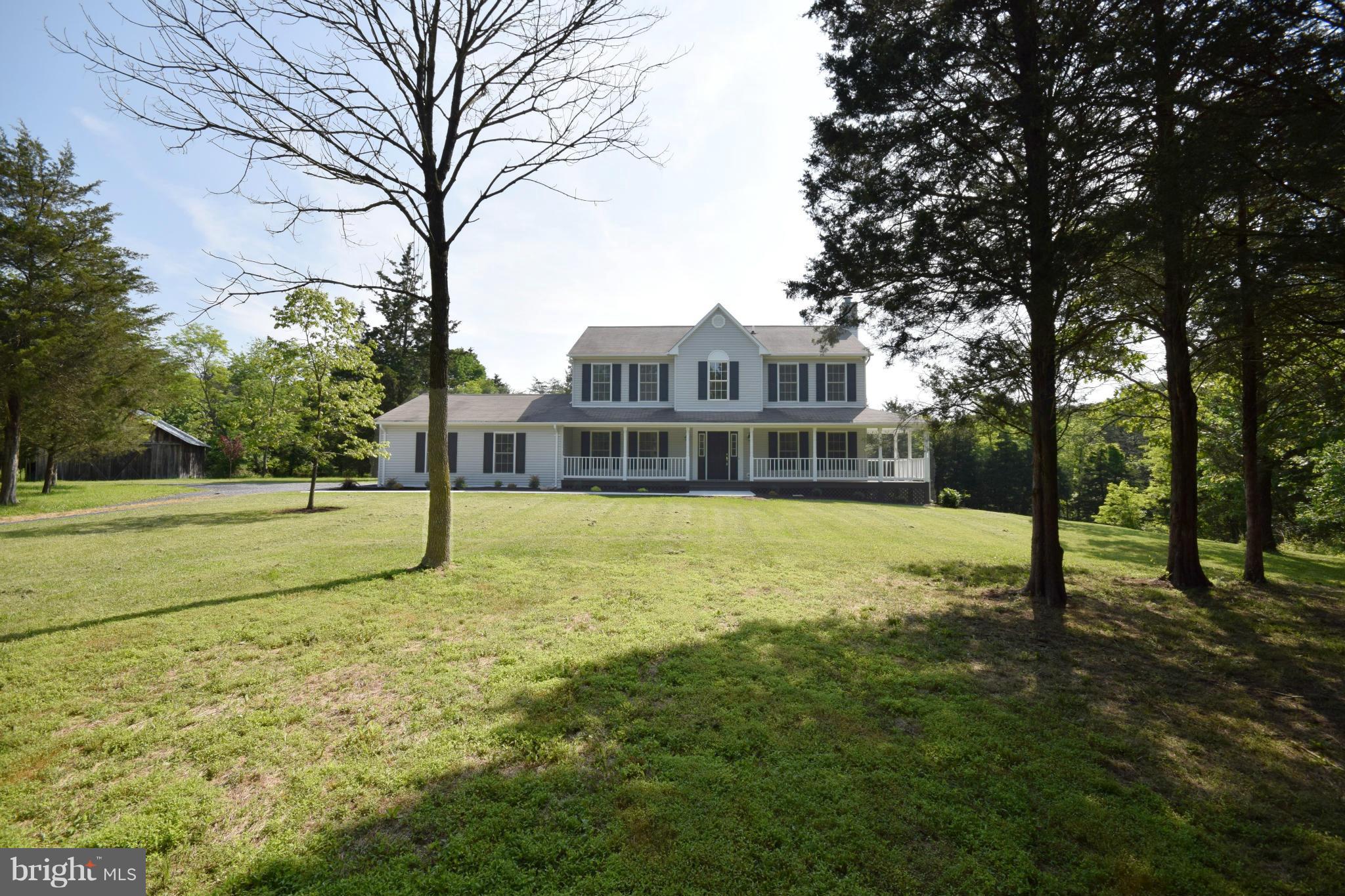 150 High Bluff Road Middletown, VA 22645 - Photo 3 of 30 a view of a house with a yard