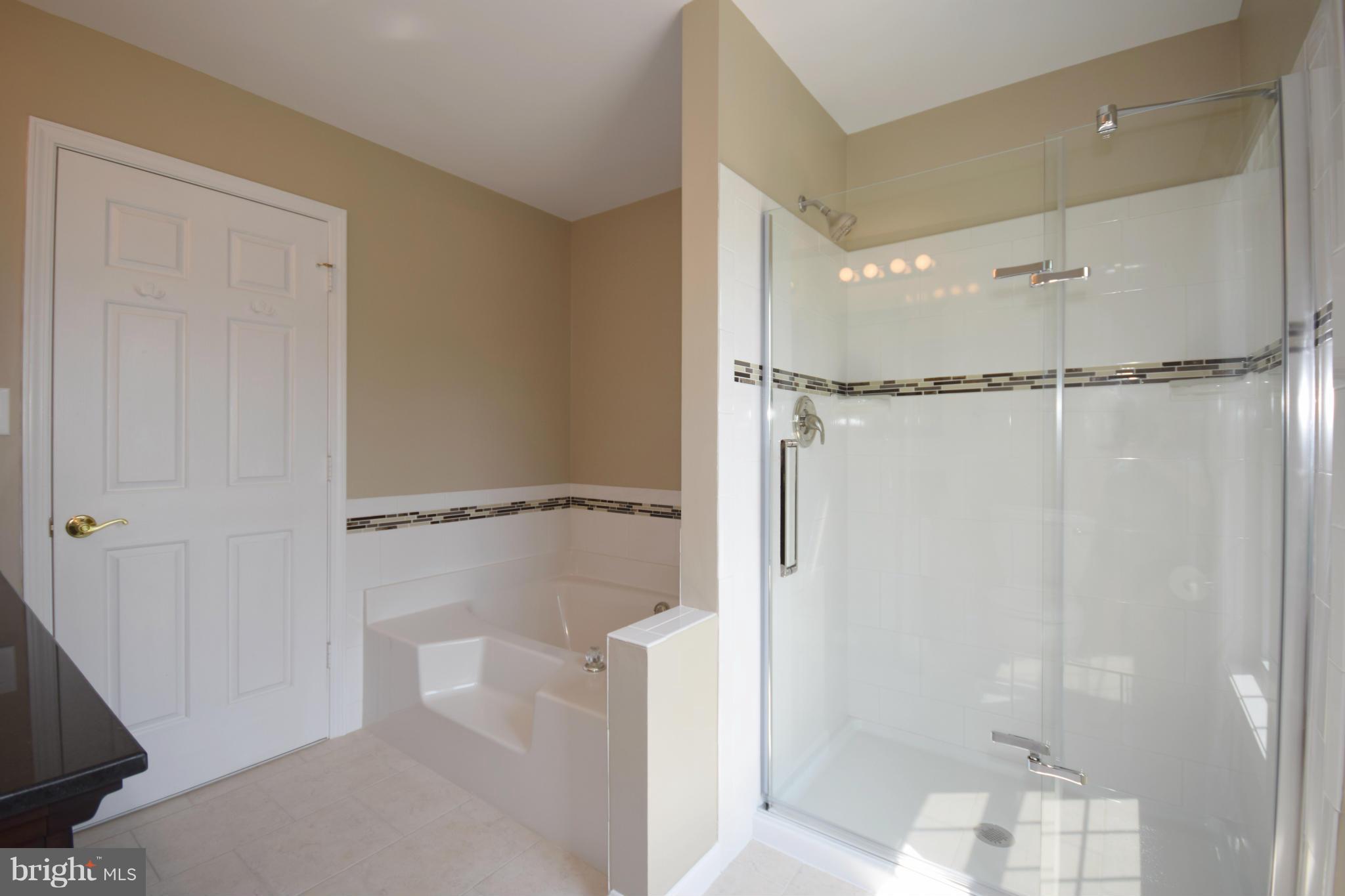 150 High Bluff Road Middletown, VA 22645 - Photo 22 of 30 a bathroom with a glass shower door