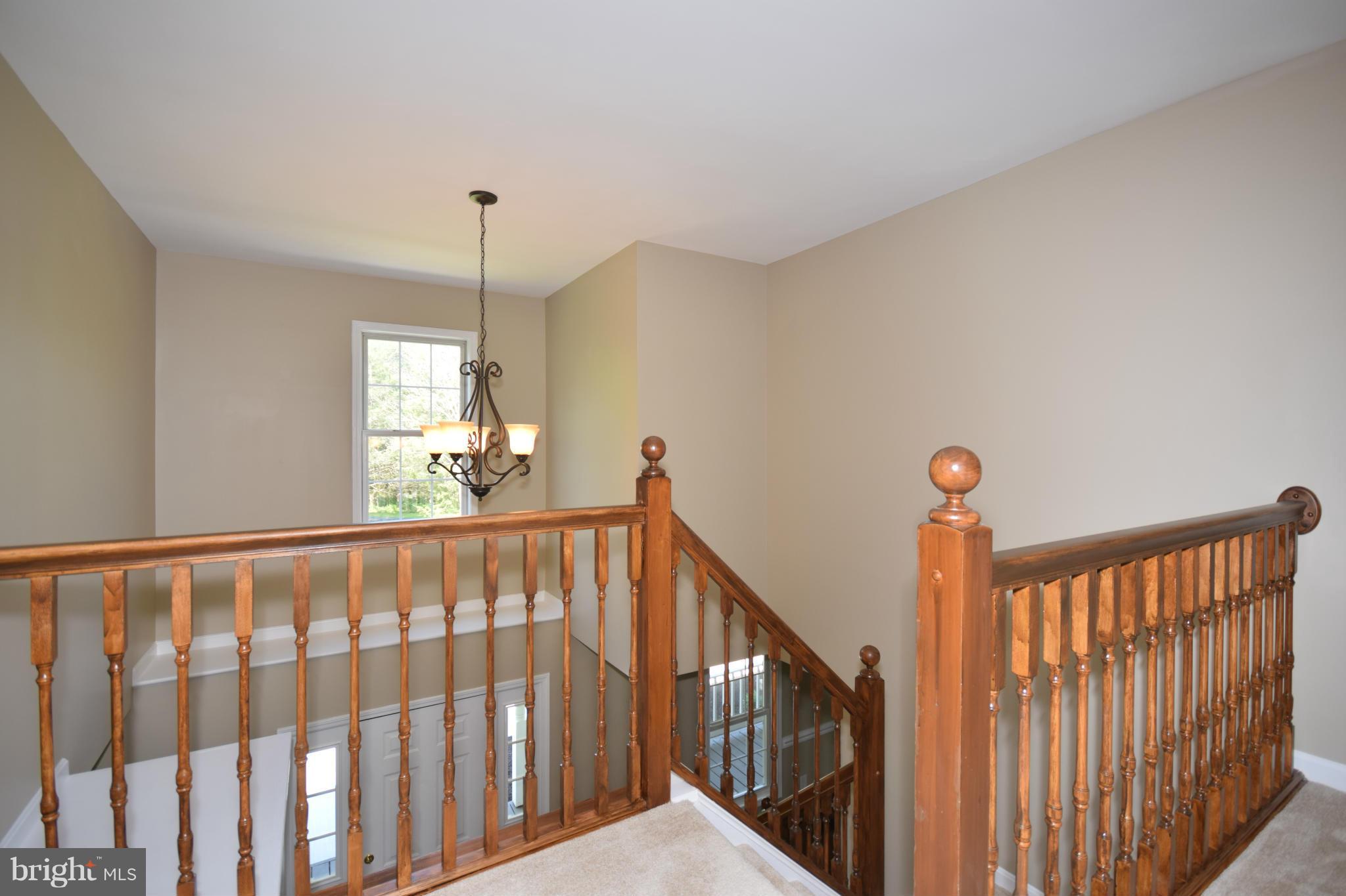 150 High Bluff Road Middletown, VA 22645 - Photo 30 of 30 a view of hallway with stairs