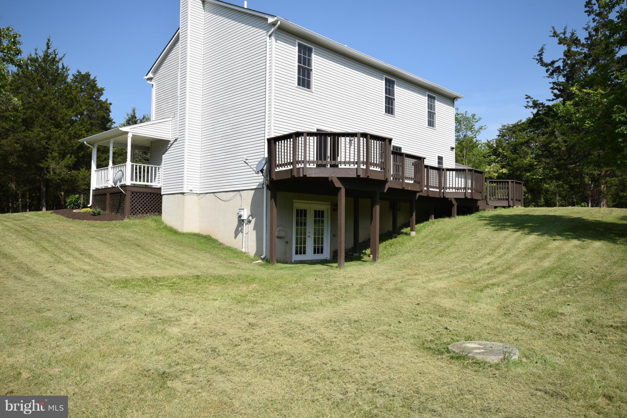 150 High Bluff Road Middletown, VA 22645 - Photo 6 of 30 a view of a house with backyard porch and sitting area