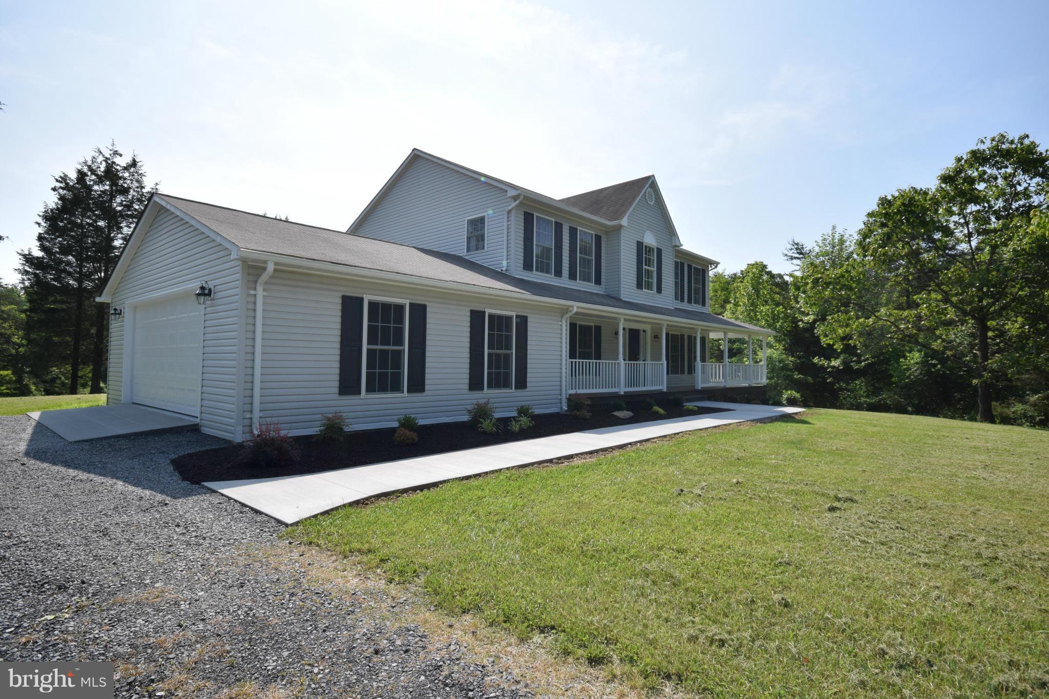 150 High Bluff Road Middletown, VA 22645 - Photo 7 of 30 a front view of house with yard and green space