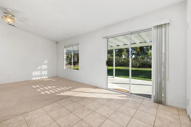 a view of livingroom with furniture and window