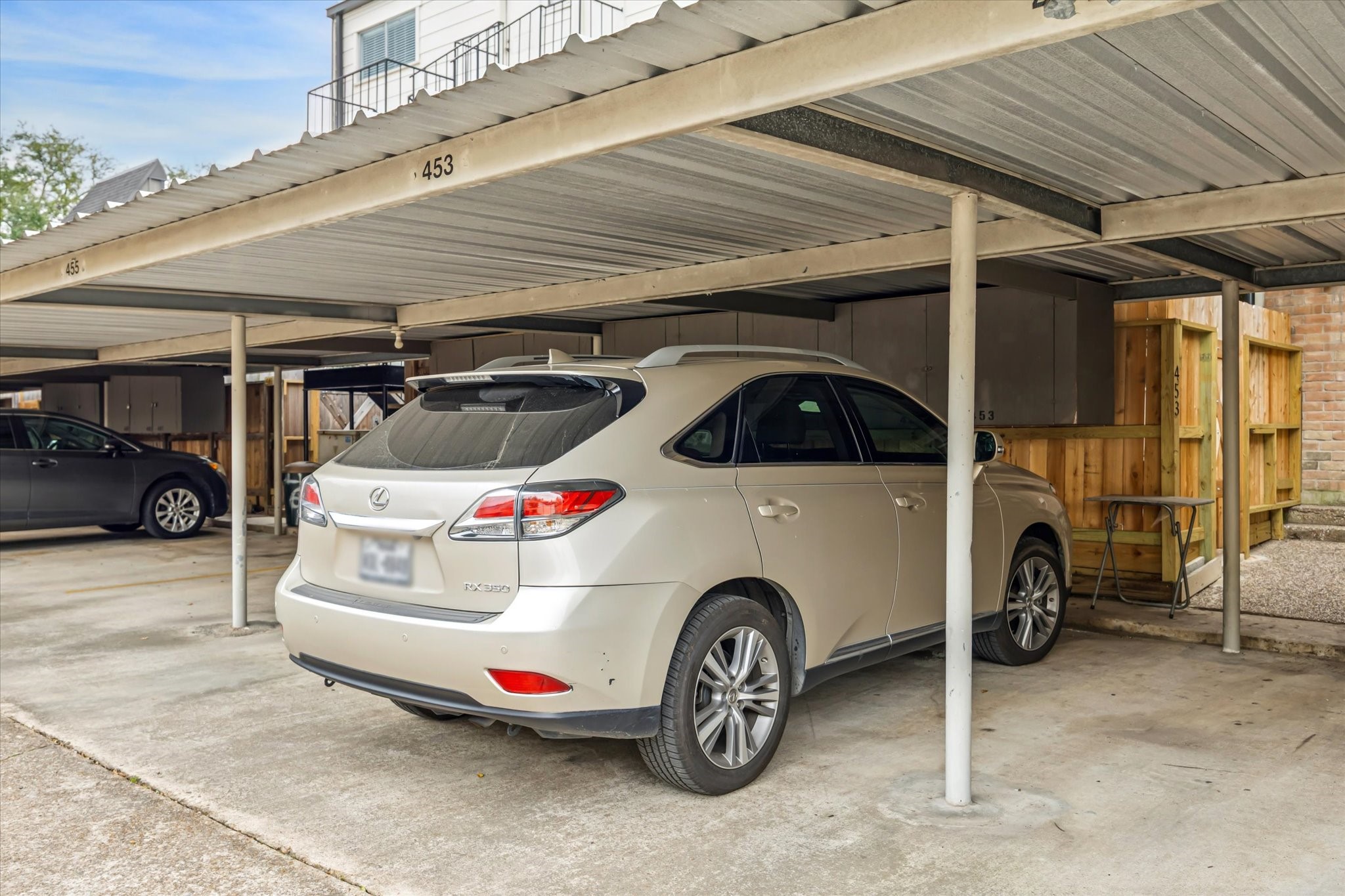 453 North Post Oak Lane Houston, TX 77024 - Photo 13 of 18 a car parked in garage