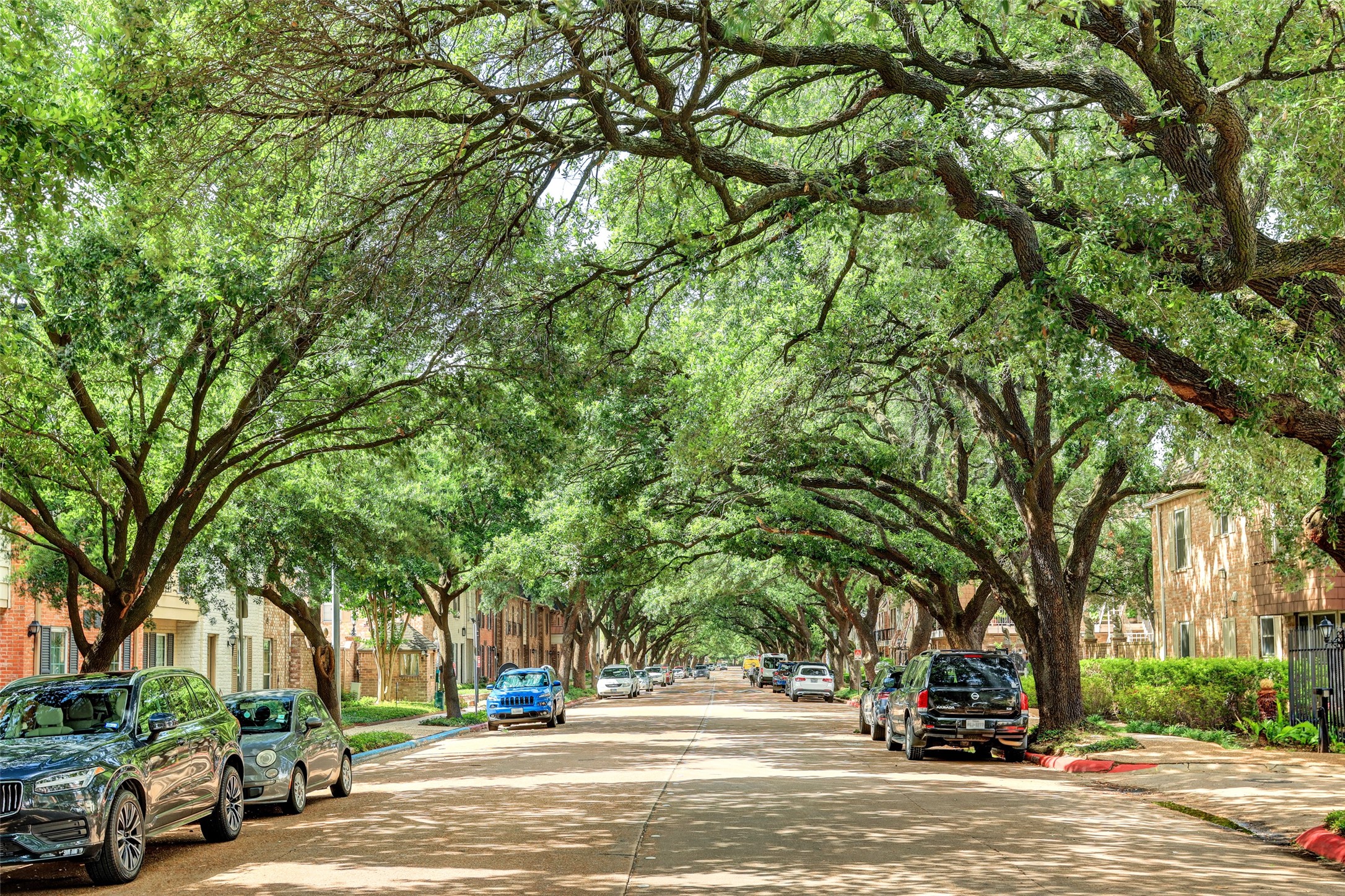 453 North Post Oak Lane Houston, TX 77024 - Photo 18 of 18 a view of street with parked cars