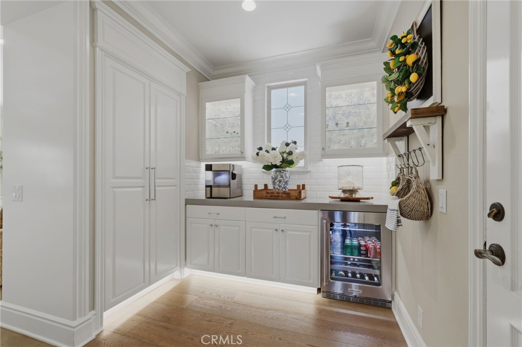 10 Jenny Lane Ladera Ranch, CA 92694 - Photo 24 of 64 Butlers pantry with beverage fridge and custom storage cabinetry