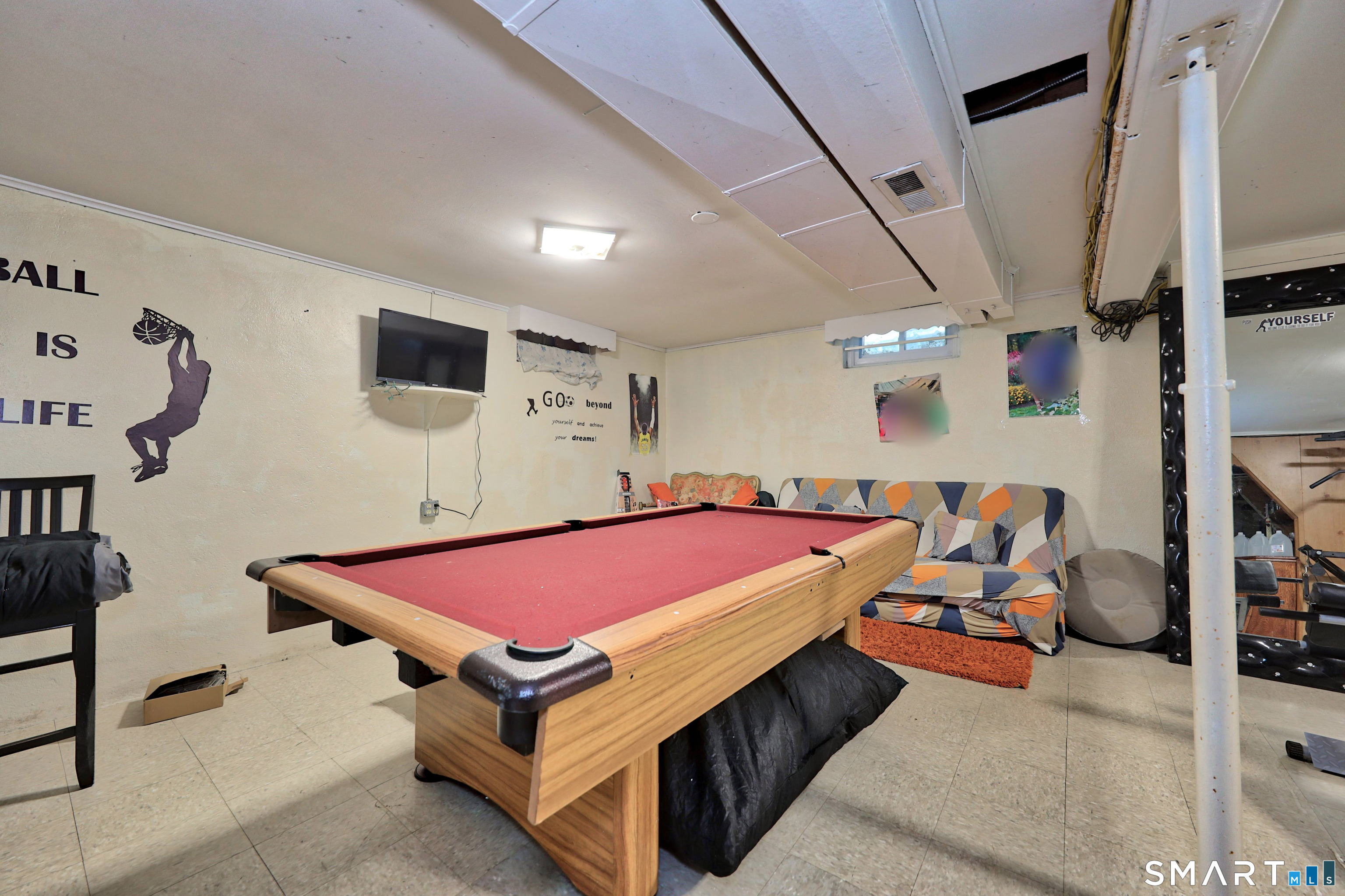 17 Rosedale Avenue Waterbury, CT 06705 - Photo 20 of 20 a room with furniture and air hockey table