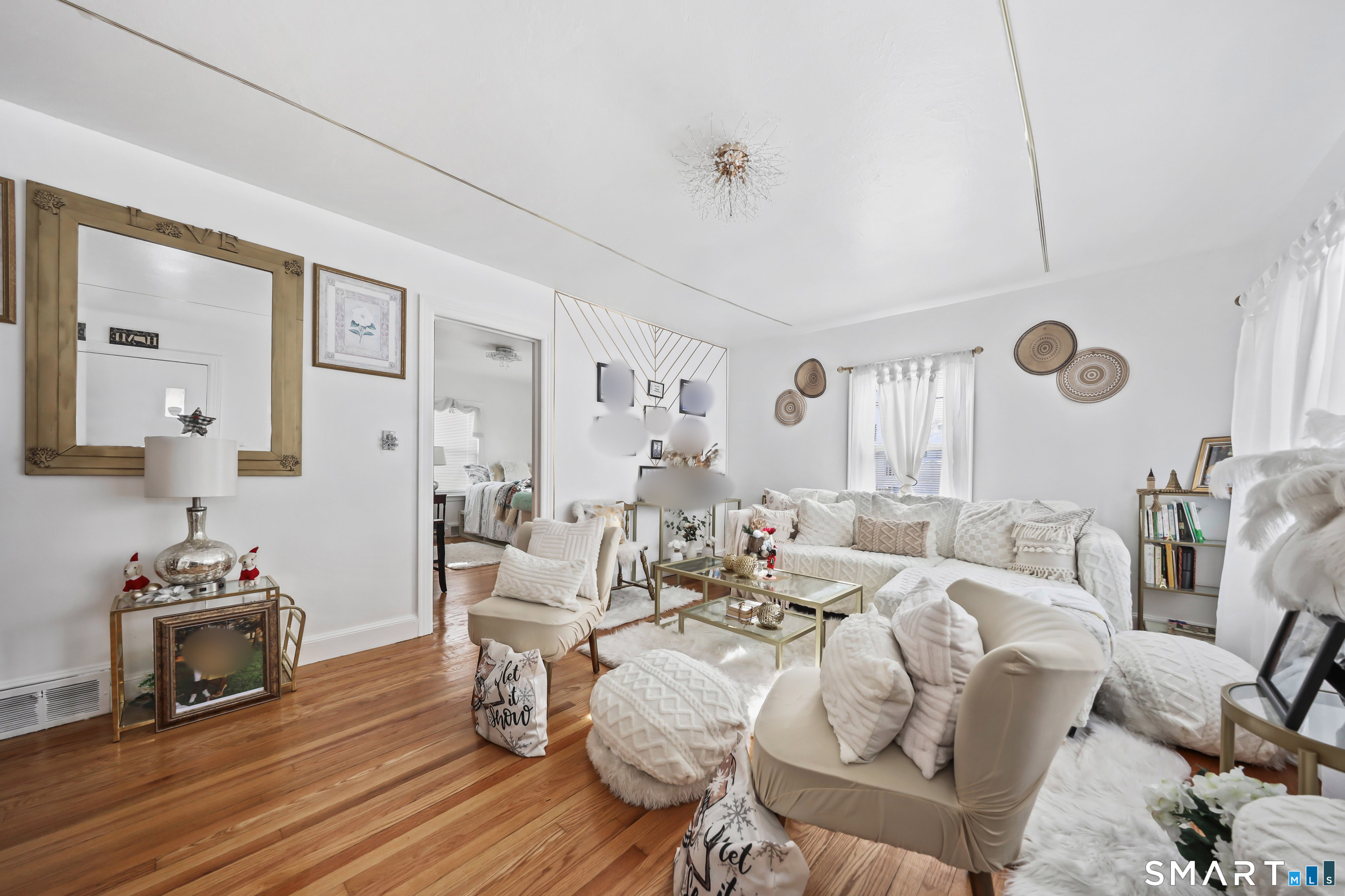17 Rosedale Avenue Waterbury, CT 06705 - Photo 2 of 20 a living room with furniture and wooden floor