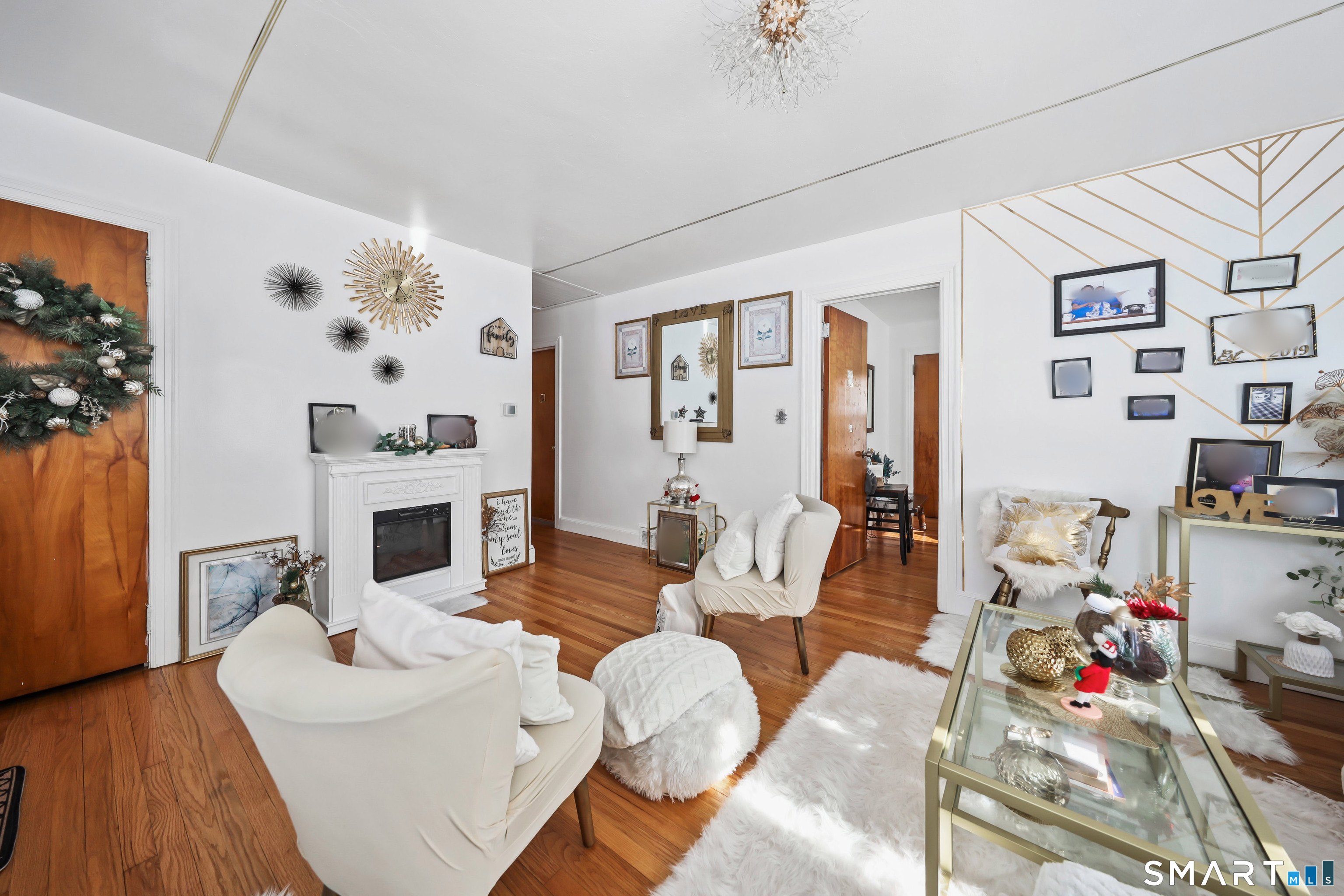 17 Rosedale Avenue Waterbury, CT 06705 - Photo 4 of 20 a living room with furniture fireplace and flat screen tv