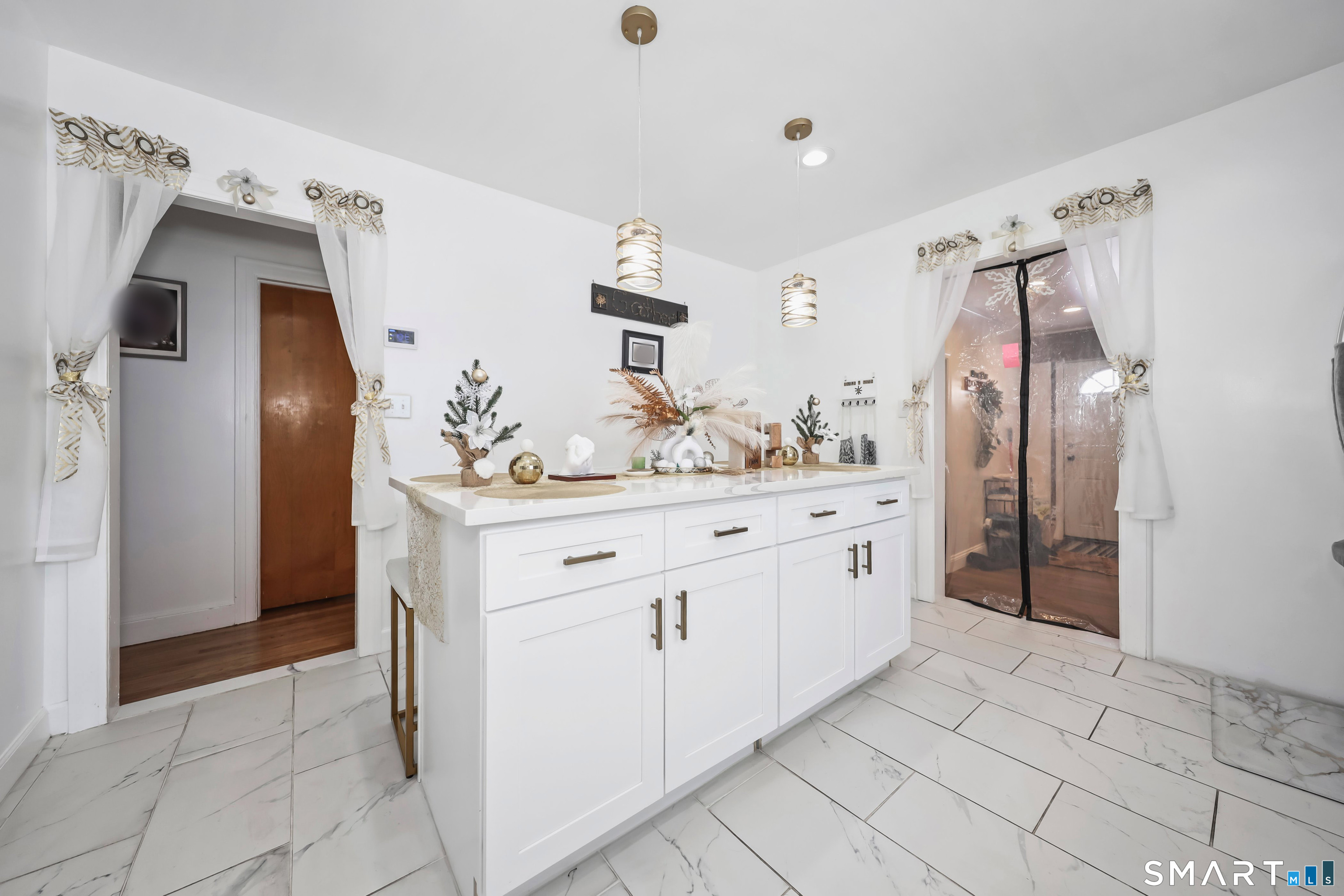 17 Rosedale Avenue Waterbury, CT 06705 - Photo 5 of 20 a spacious bathroom with a double vanity sink and a mirror