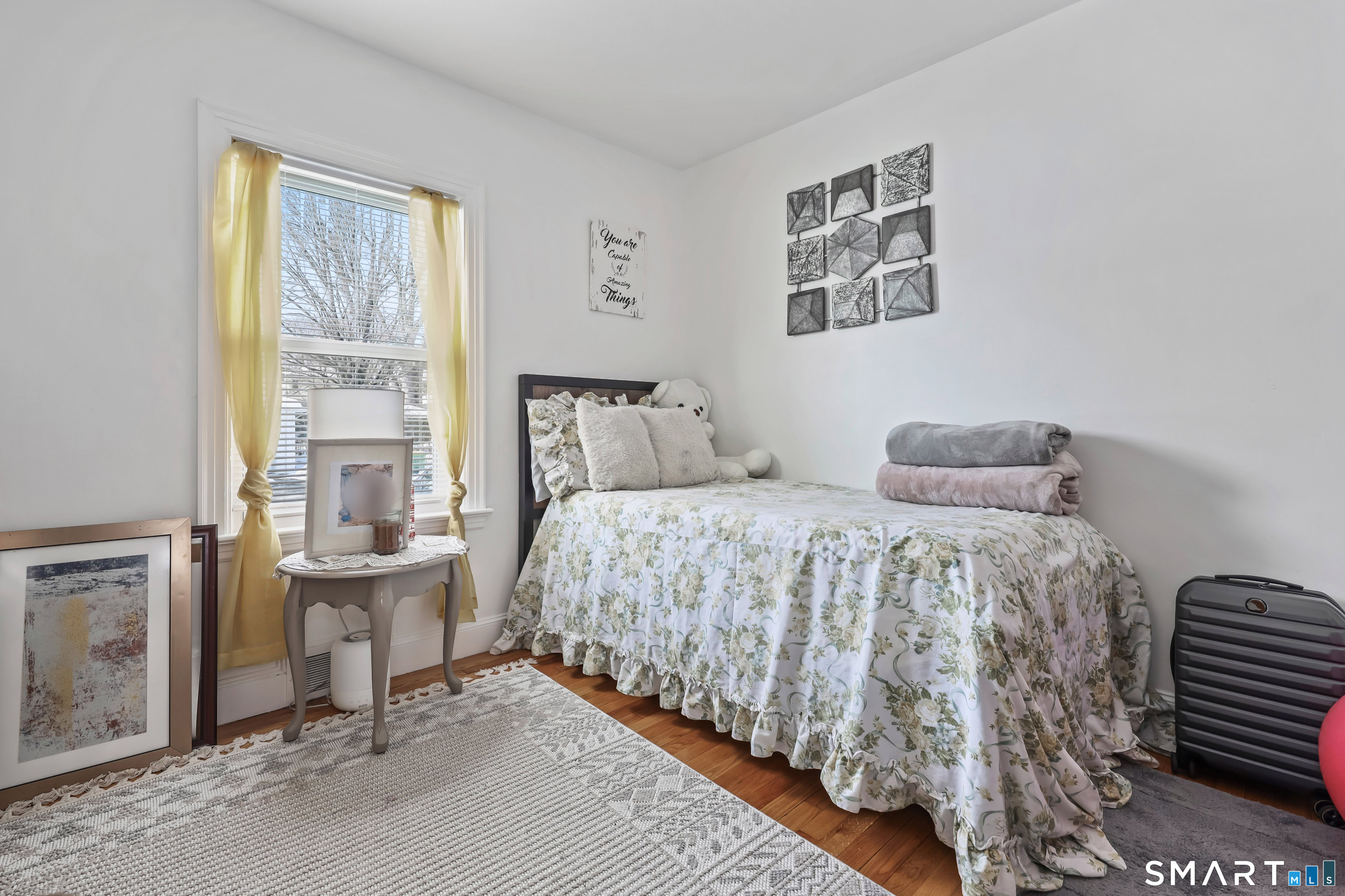 17 Rosedale Avenue Waterbury, CT 06705 - Photo 8 of 20 a bedroom with a bed and a window