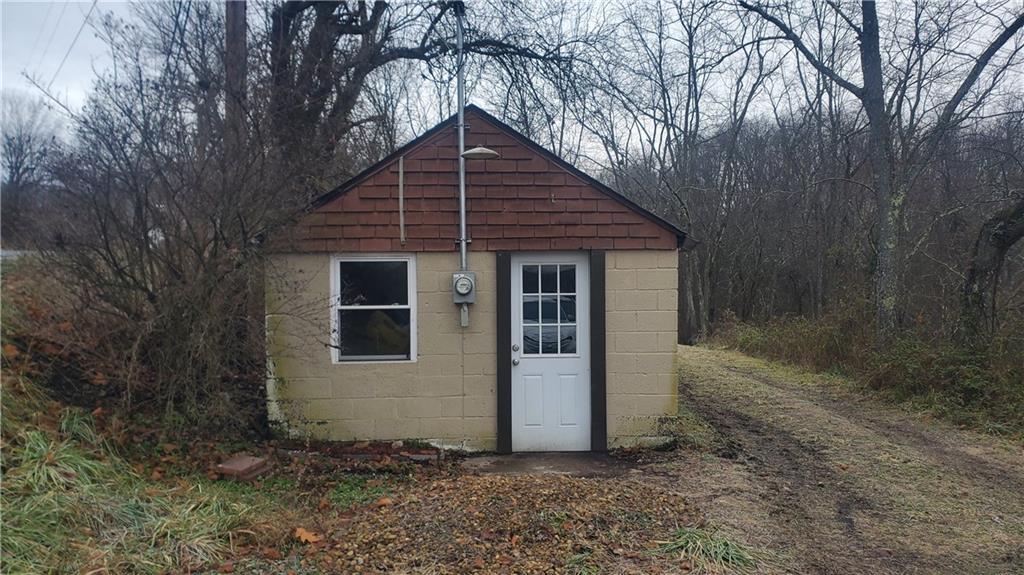 125 Michael Road Cheswick, PA 15024 - Photo 6 of 14 a house with trees in the background