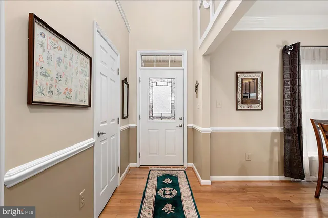 a kitchen with stainless steel appliances granite countertop a stove refrigerator and a microwave