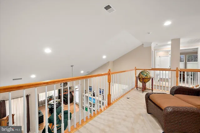 a bed room with a bed and a flat screen tv