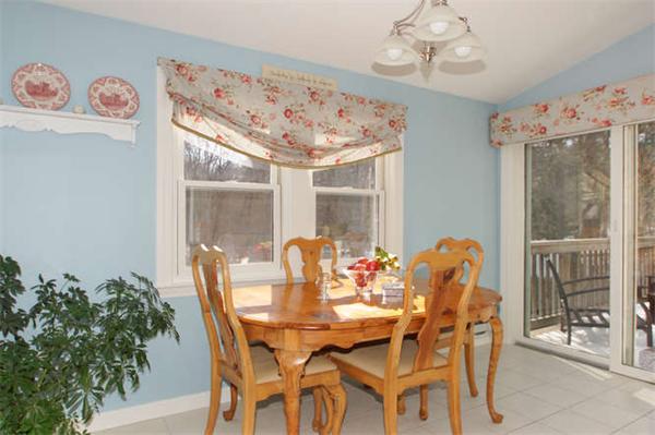 59 Felch Road Natick, MA 01760 - Photo 8 of 13 a view of a dining room with furniture window and outside view