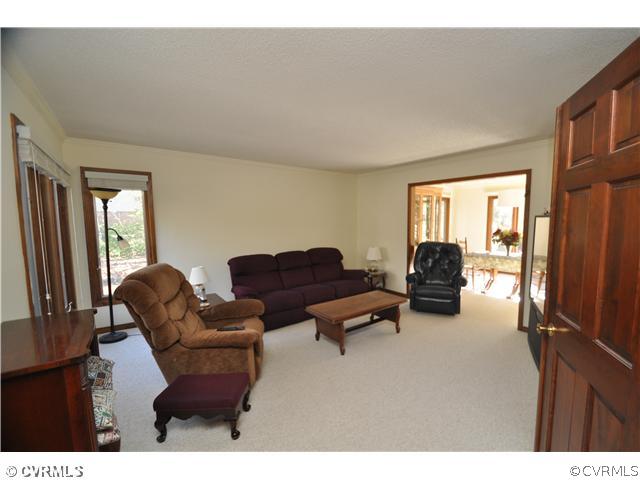 3904 Timber Ridge Road Midlothian, VA 23112 - Photo 5 of 12 a living room with furniture and a window